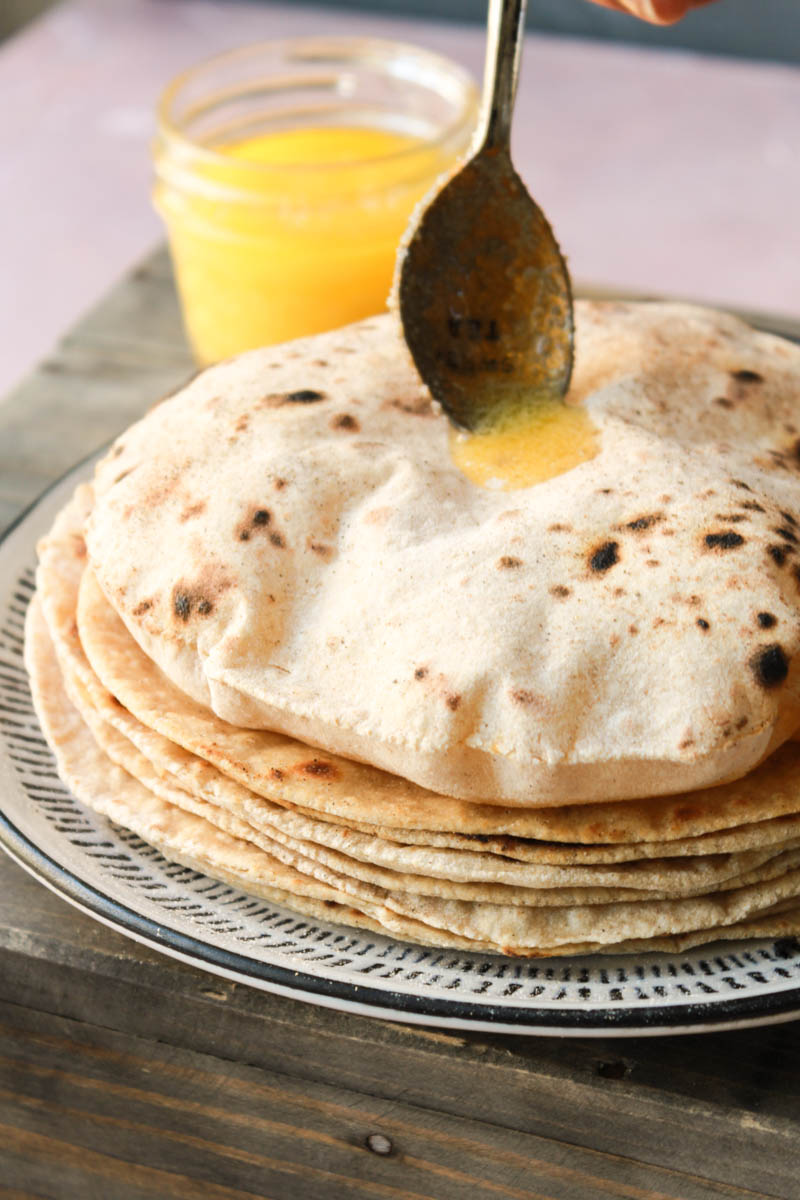 Image of Indian Soft Phulka Chapati (Roti) On Non Stick Tawa Also