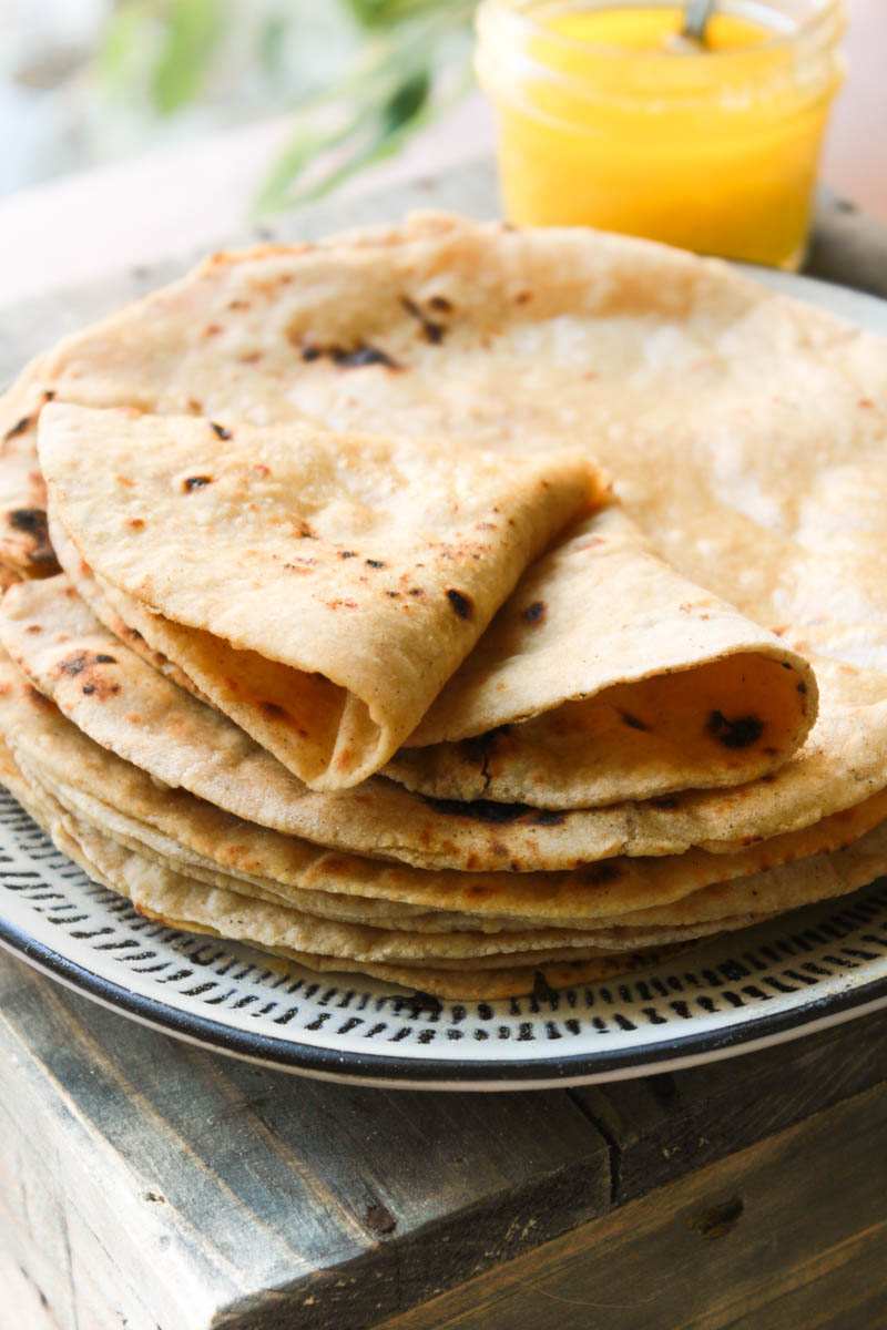 Indian soft phulka Chapati (roti) on non stick tawa Stock Photo