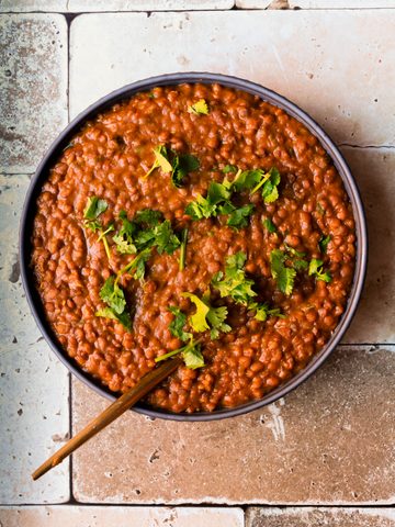 Instant Pot Whole Masoor Dal garnished with fresh cilantro