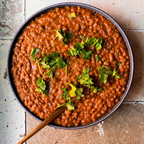 Instant Pot Whole Masoor Dal garnished with fresh cilantro